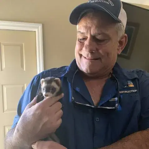 Alex today, with a customer's pet ferret