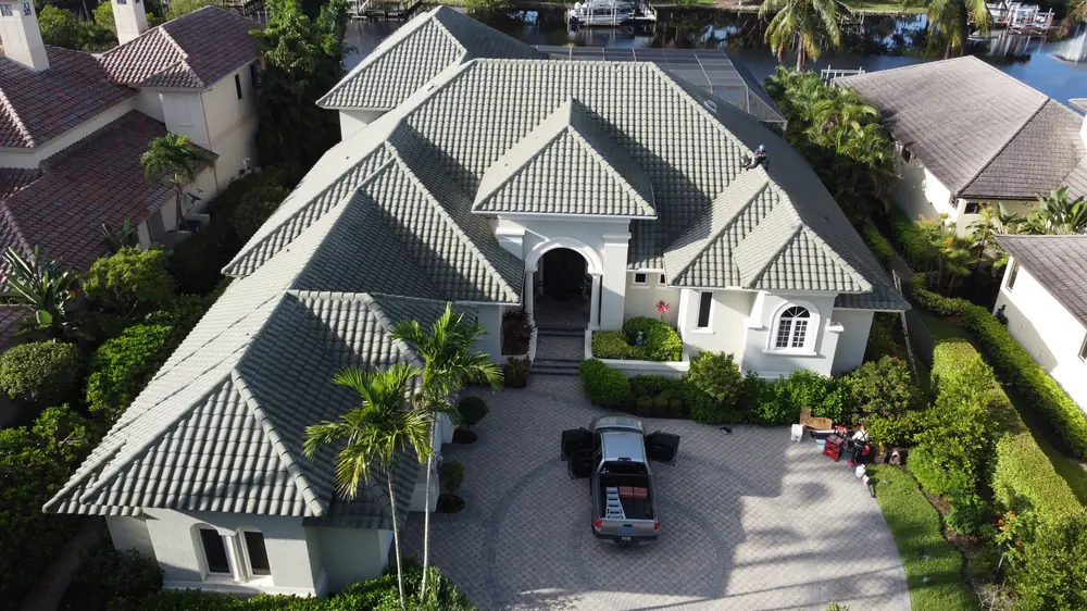 Two-story Bonita Springs estate with a new gray tile roof